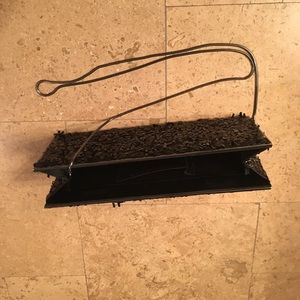 Black sequenced clutch (BCBG bag)